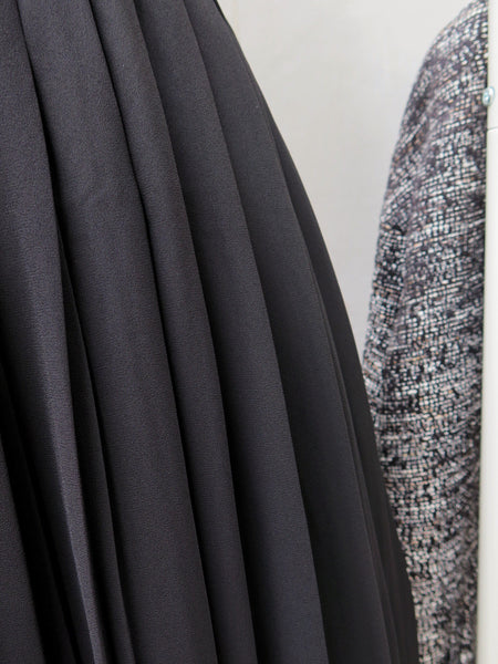 Pleaty Please | Vintage 1950s 1960s Sleeveless Fit and Flare Black dress with pleated skirt