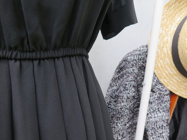 Pleaty Please | Vintage 1950s 1960s Sleeveless Fit and Flare Black dress with pleated skirt