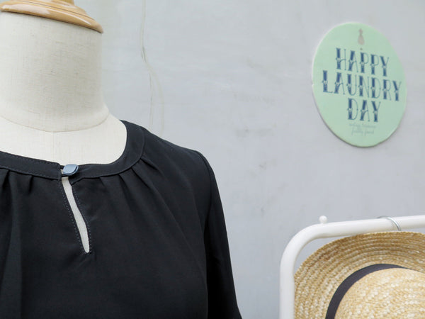 Pleaty Please | Vintage 1950s 1960s Sleeveless Fit and Flare Black dress with pleated skirt