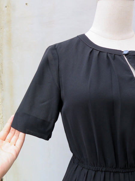 Pleaty Please | Vintage 1950s 1960s Sleeveless Fit and Flare Black dress with pleated skirt
