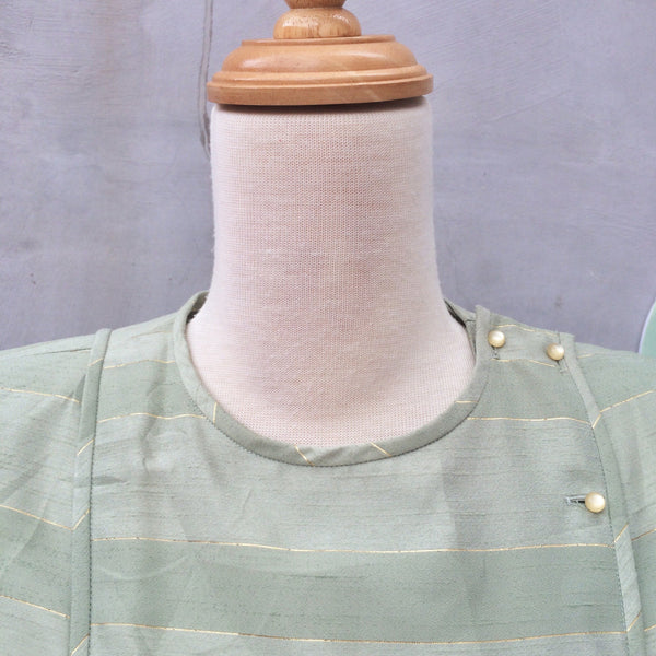 SALE! | Pastilles Bon Bon | Vintage 1950s asymmetric buttons Gold thread Pastel green Dress