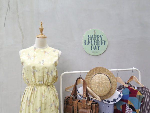 Hanamee | Vintage 1950s 1960s pastel yellow silky Dress with button back and butterfly print