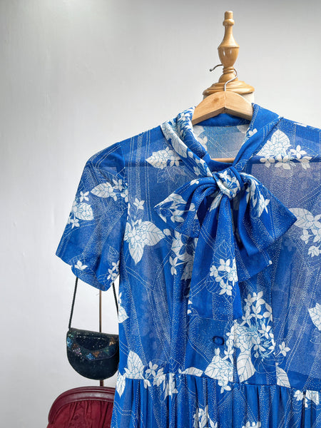 Blue and white floral neck tie dress