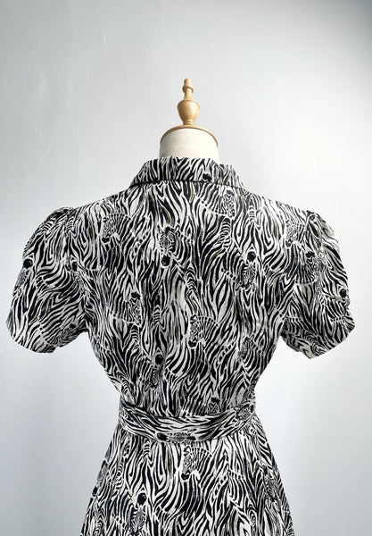 Must-have! | Zelda | Vintage 1970s/80s zebra print fit-and-flare A line dress with matching belt