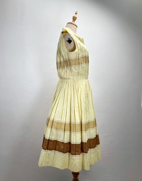 Vintage 1950s mid-century pleated sleeveless dress in lemon yellow | Brûlée | { Rare Find }