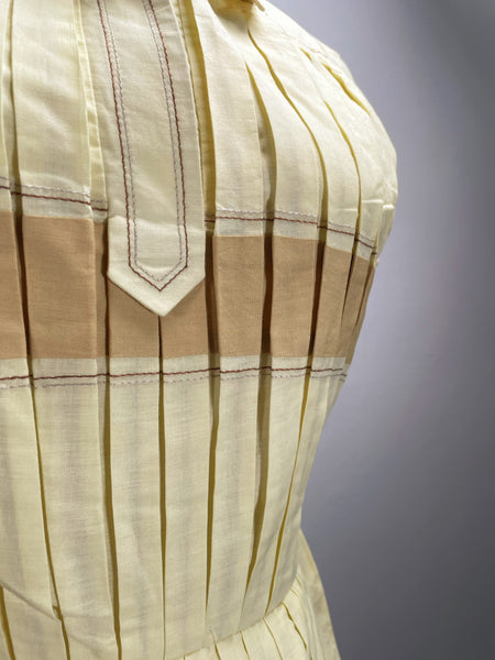 Vintage 1950s mid-century pleated sleeveless dress in lemon yellow | Brûlée | { Rare Find }