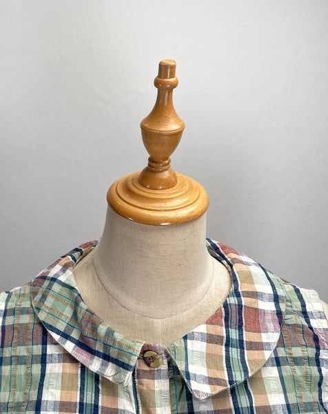 Daphne | Vintage 1980s cheesecloth sleeveless plaid dress with Peter Pan collar and pockets
