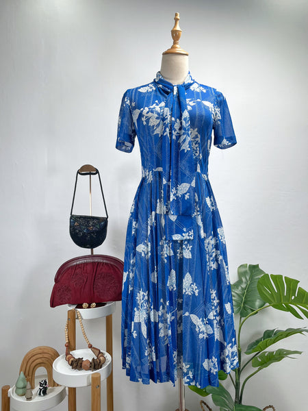 Blue and white floral neck tie dress