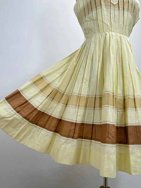 Vintage 1950s mid-century pleated sleeveless dress in lemon yellow | Brûlée | { Rare Find }