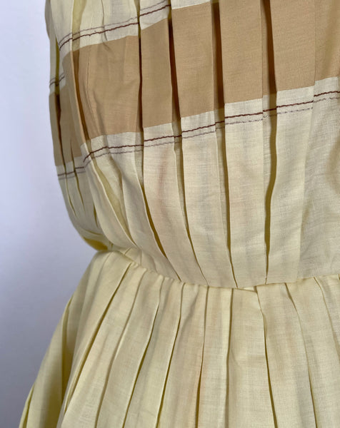 Vintage 1950s mid-century pleated sleeveless dress in lemon yellow | Brûlée | { Rare Find }