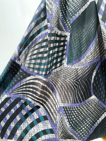 Noelle | Vintage 1970s geometric swirl print dress with matching fabric buttons