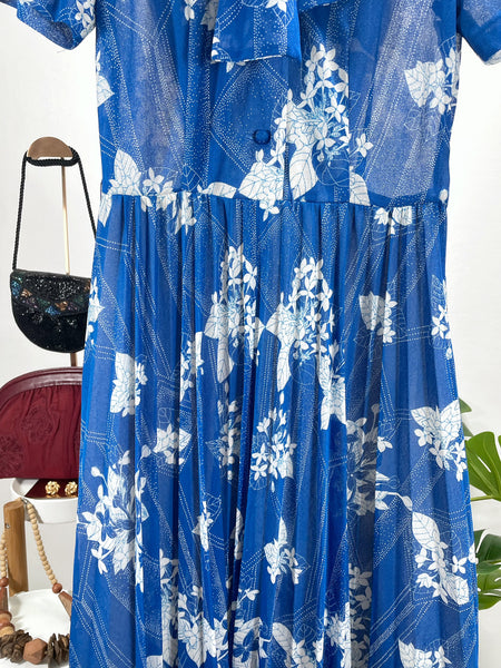 Blue and white floral neck tie dress
