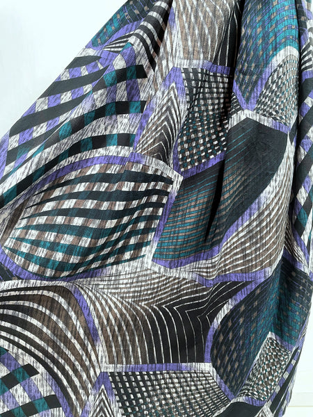 Noelle | Vintage 1970s geometric swirl print dress with matching fabric buttons