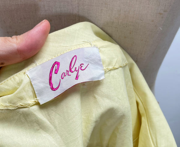 Vintage 1950s mid-century pleated sleeveless dress in lemon yellow | Brûlée | { Rare Find }