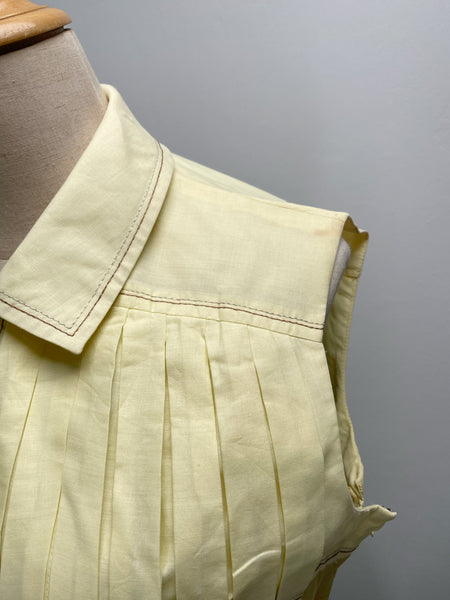 Vintage 1950s mid-century pleated sleeveless dress in lemon yellow | Brûlée | { Rare Find }