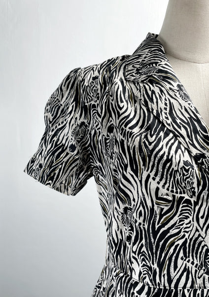 Must-have! | Zelda | Vintage 1970s/80s zebra print fit-and-flare A line dress with matching belt
