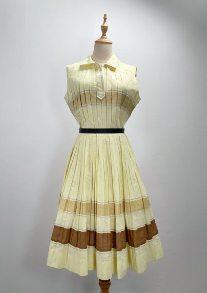 Vintage 1950s mid-century pleated sleeveless dress in lemon yellow | Brûlée | { Rare Find }