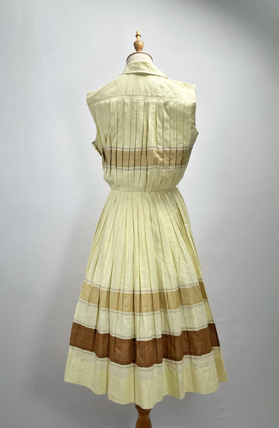 Vintage 1950s mid-century pleated sleeveless dress in lemon yellow | Brûlée | { Rare Find }