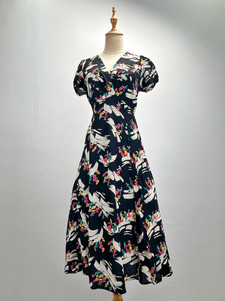 Gaia | Vintage 1940s novelty print fashion girls flared dress with belt tie