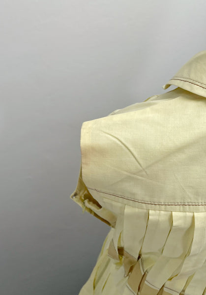 Vintage 1950s mid-century pleated sleeveless dress in lemon yellow | Brûlée | { Rare Find }