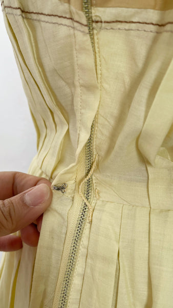 Vintage 1950s mid-century pleated sleeveless dress in lemon yellow | Brûlée | { Rare Find }