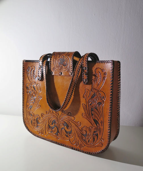 Vintage 60s 70s honey-tan leather tooled tote with Ornate carvings and turnlock closure bohemian hippie style