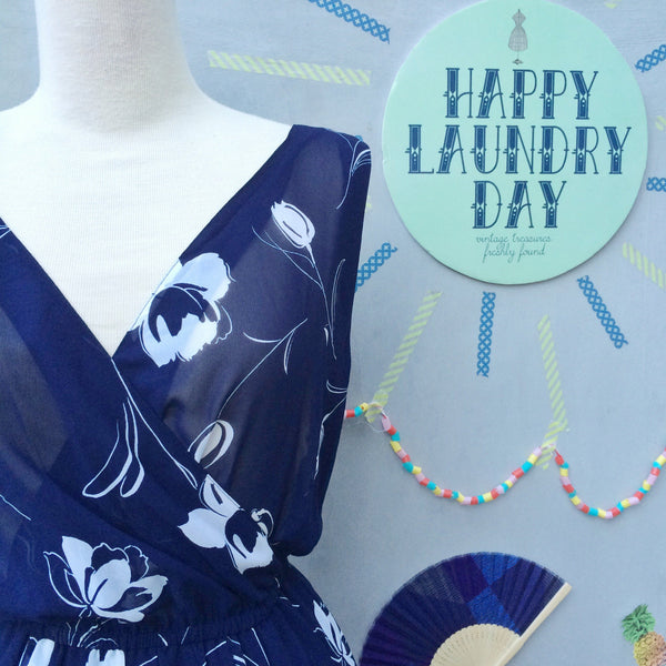 Midnight Clouds | Vintage 1950s V-neck and V-back Flowy Tulip print Navy blue and white 1970s Sexy Disco dress