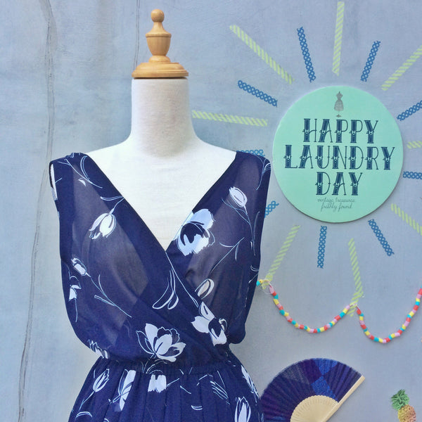 Midnight Clouds | Vintage 1950s V-neck and V-back Flowy Tulip print Navy blue and white 1970s Sexy Disco dress