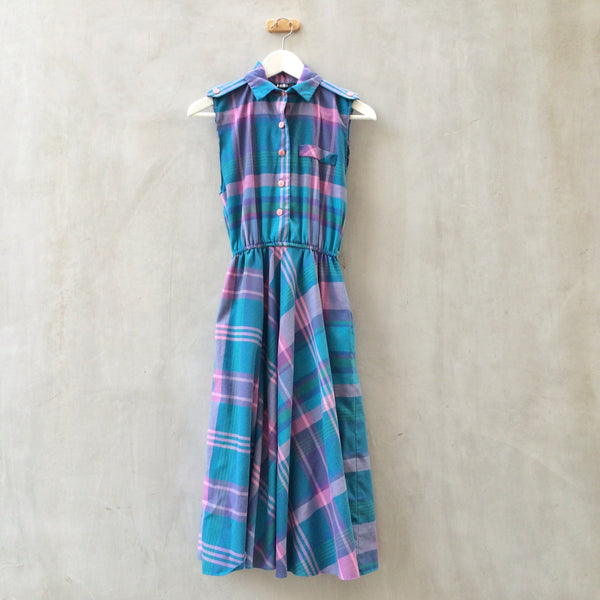 Twinkly Midnight Eyes | Vintage 1950s plaid dress in pink purple and blues with Pockets