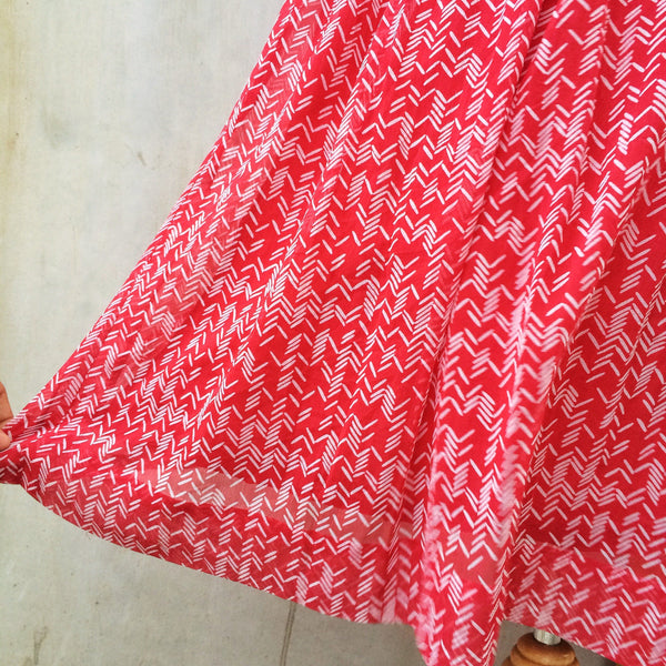 Raspberry Ruby | Vintage 1960s 1970s flirty red skirt with Pseudo herringbone print | White geometric print