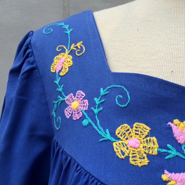 Cornflowers Florals | Vintage 1970s 1980s Cornflower blue Embroidered flora and Rainbow stripe hem Loose fit Slouchy Dress