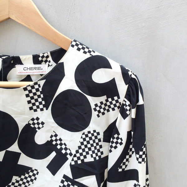 Long Division | Vintage 1980s long-sleeved Monochrome black and white Crop Top with Geometric Math Print