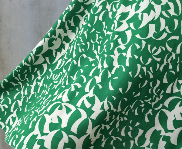 Green Curves | Vintage 1970s 1980s Grass green dress with pale cream crescent strips | Confetti Party Anyone?