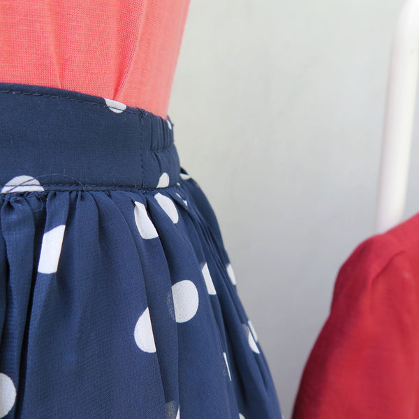 Zoey | Vintage 1960s 1970s polka dot blue and navy print mid-length skirt 